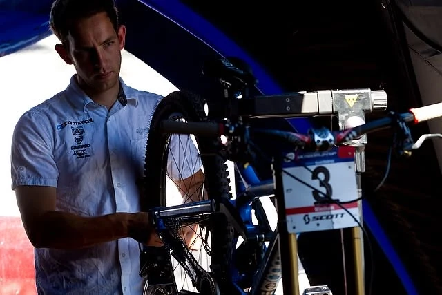 Pete preparing a race bike in the Commencal team pits